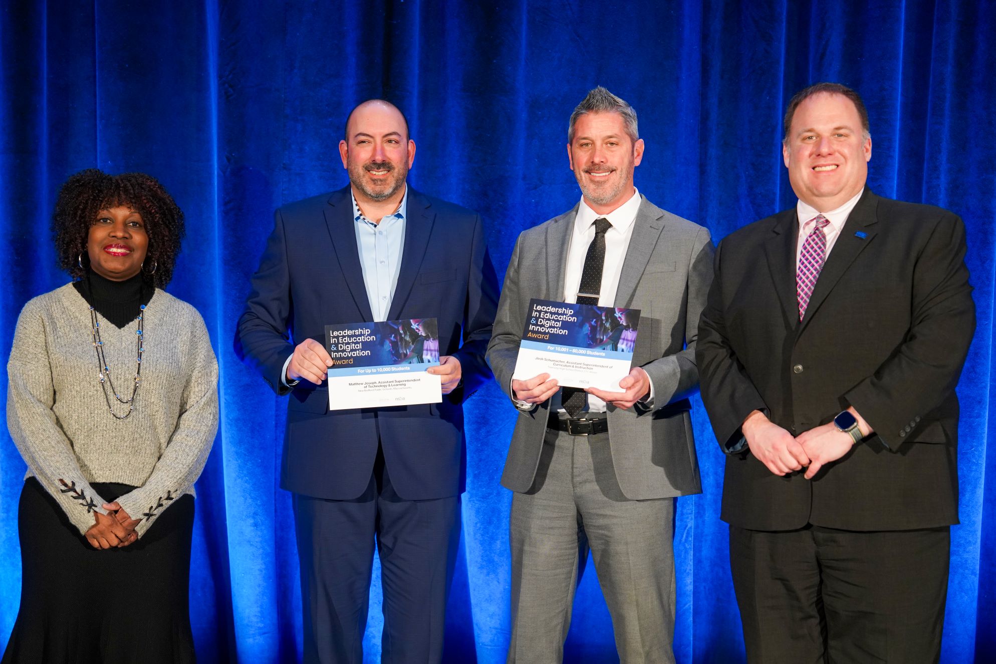 Matthew Joseph and Josh Schumacher with NSBA Executive Director Verjeana McCotter-Jacobs and NSBA President Devin Sheehan