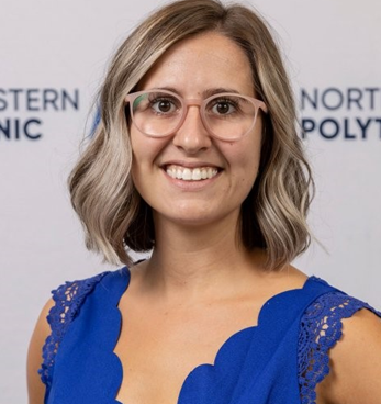 A person wearing glasses and a blue dress

AI-generated content may be incorrect.