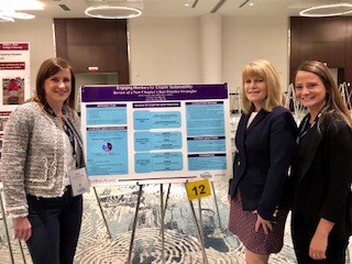 Jenn Kuretski (Secretary) mentors Christine Conti (President) and Jessica Nasrallah (recent BSN graduate and Webmaster) to present their first poster presentation!