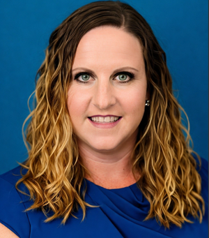 A person with long blonde hair wearing a blue dress

AI-generated content may be incorrect.