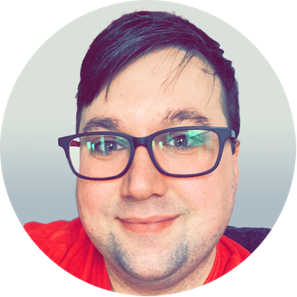 A person wearing glasses and smiling

AI-generated content may be incorrect.