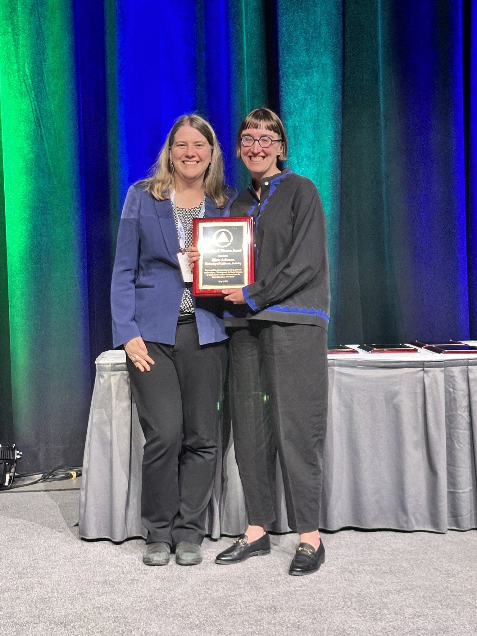 Hero Ashman accepts the Thomas Award from Dr. Killewald