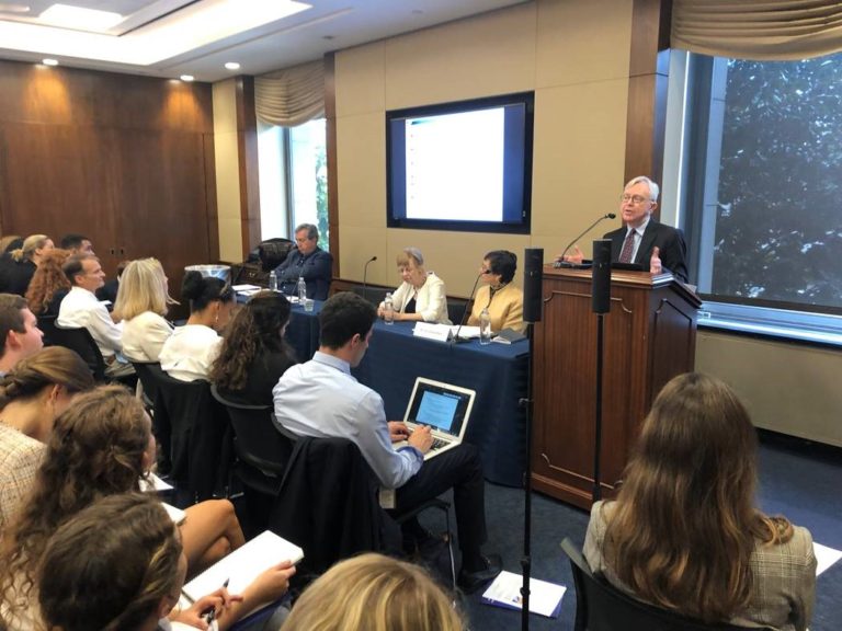 Dr. Moffitt addresses the packed room of congressional staff.