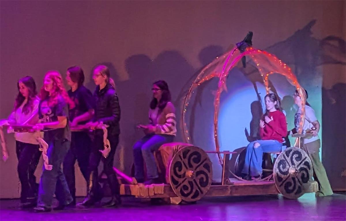 carriage with seating for 2 inside pumpkin as well as a driver