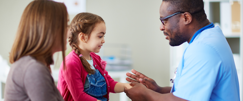 Doctor with young patient