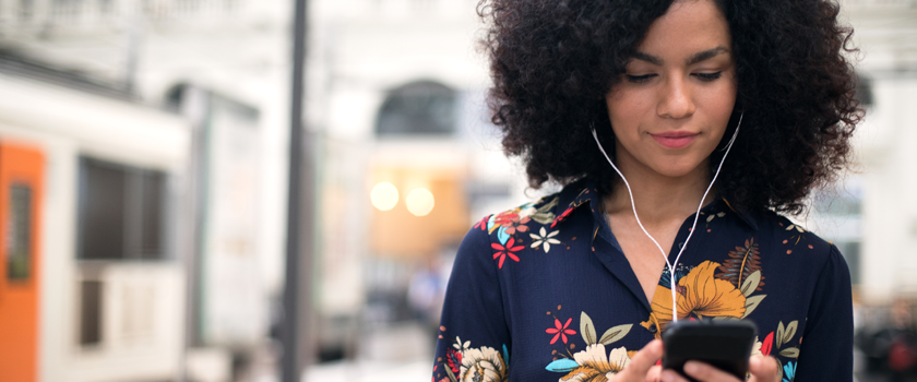 woman listening to podcast