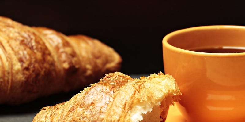 Croissant and coffee Croissant and orange coffee mug