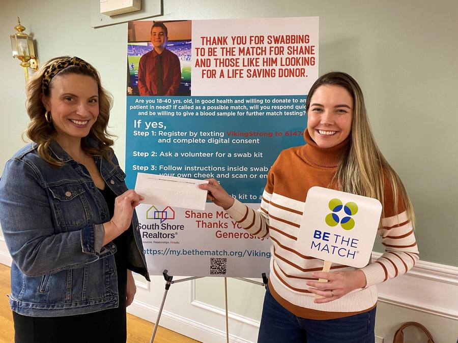 Two members at a Be The Match bone marrow donor registration drive