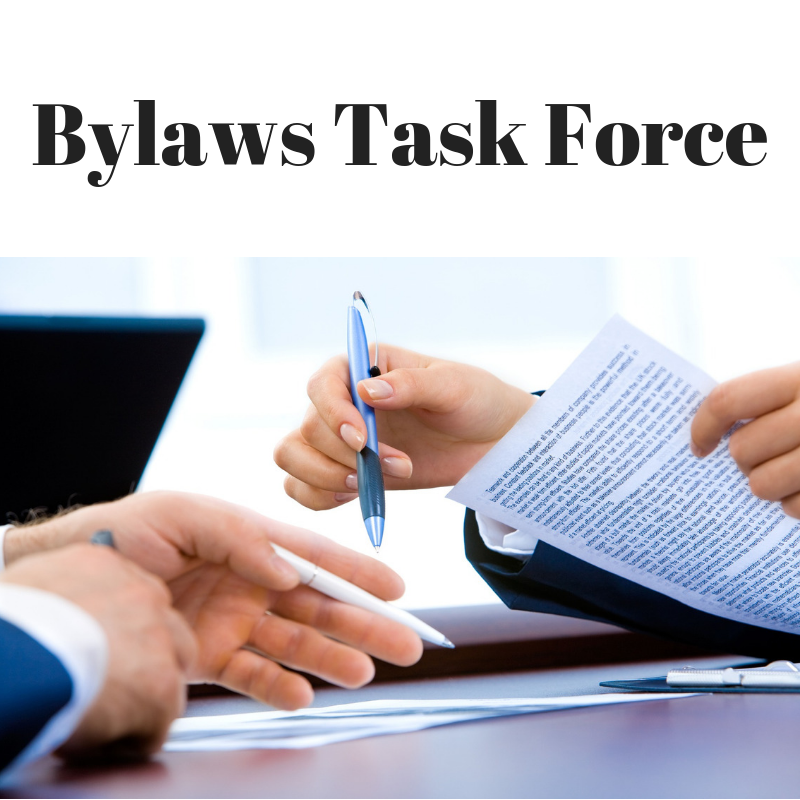Space Coast Association of REALTORS® Bylaws Task Force Logo Bylaws Task Force Graphic depicting two pairs of hands going over paperwork