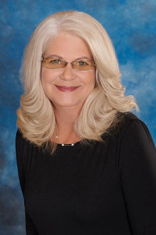 Tari Edwards in black business attire Tari Edwards Headshot