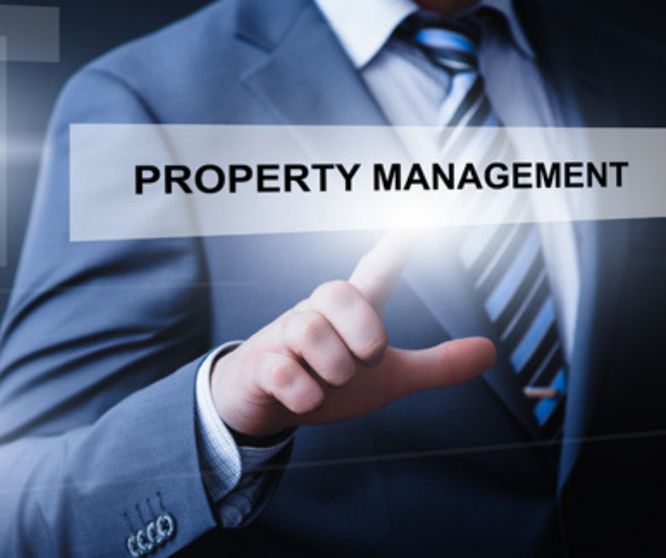 Space Coast Association of REALTORS® Property Management logo A man pointing at a graphic that reads Property Management