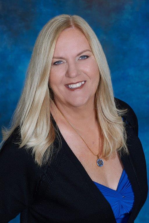 Marie Strohm Headshot Marie Strohm in business attire