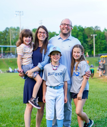 Ashely Heinrich, MS, RDN, LD with her family