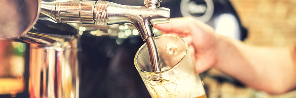 St. Charles Missouri Pub Bartender pouring a beer