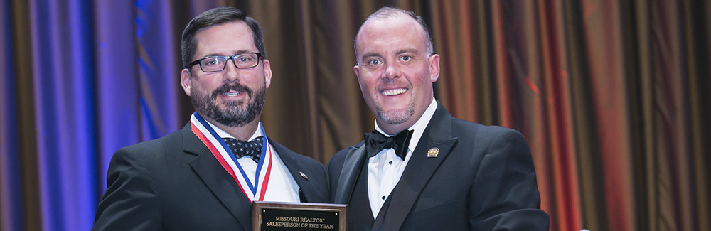 Sean Moore receiving the 2017 REALTOR® Salesperson of the Year Sean Moore receiving the 2017 REALTOR® Salesperson of the Year