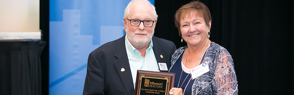 Sharon Keating accepts the Bruce Aydt Code of Ethics Leadership Award Sharon Keating accepts the Bruce Aydt Code of Ethics Leadership Award