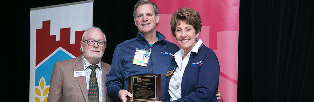 Bob Bax accepts the Bruce Aydt Code of Ethics Leadership Award Bob Bax accepts the Bruce Aydt Code of Ethics Leadership Award