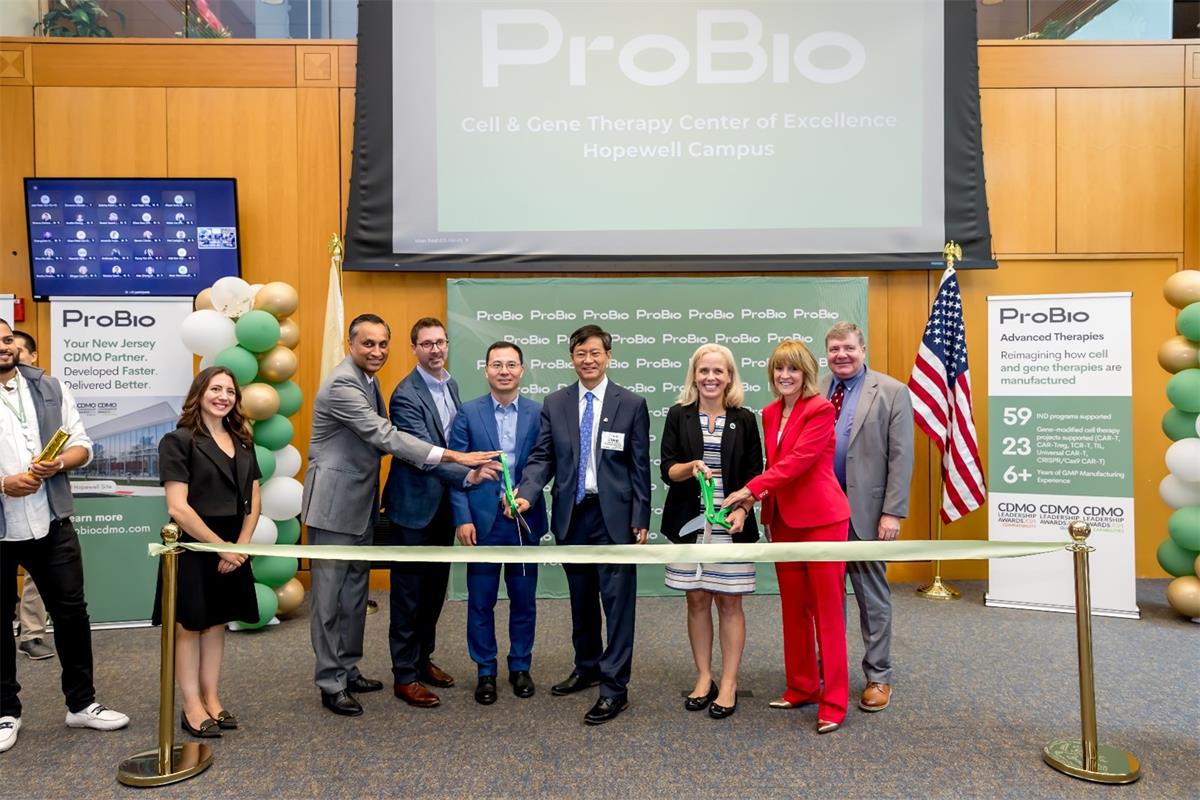From left to right - Kristen Foca (Office of Senator Andy Kim), John Coelho (NJEDA), Michael Vreeland (Site Head, ProBio Hopewell), Allen Guo (CEO, ProBio), Frank Zhang (Founder & Chairman, GenScript), Courtney Peters‑Manning (Mayor of Hopewell Township), Debbie Hart (CEO, BioNJ), and Kevin Kuchinski (Township Committee Member) - join forces to officially cut the ribbon, marking the launch of ProBio's Cell and Gene Therapy Center of Excellence in Hopewell, New Jersey. 