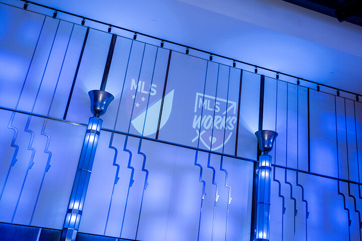 Wall showing of MLS and MLS Works Logo WISE WWOY 2018 Luncheon