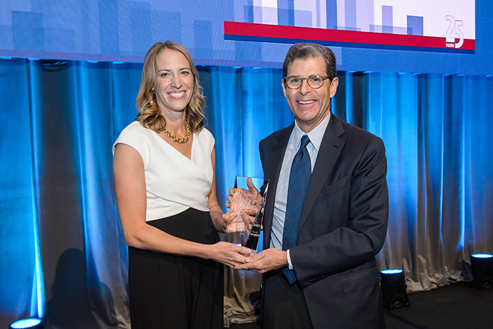 Lindsay Amstutz accepting award at the WISE WWOY 2018 Luncheon