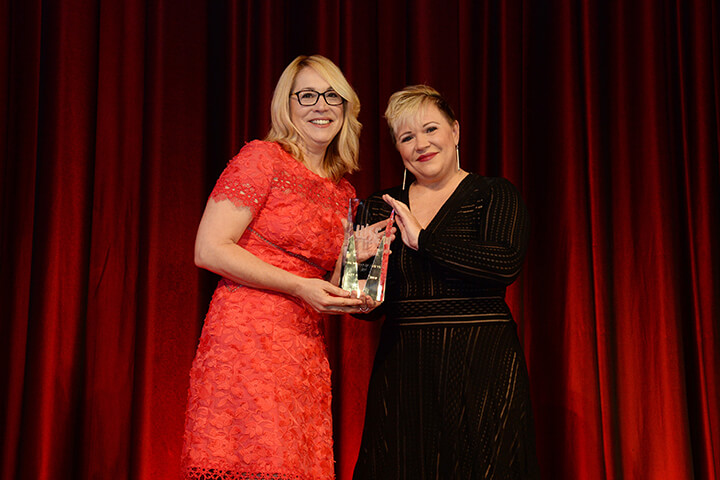 Award winner on stage 2017 WISE Luncheon