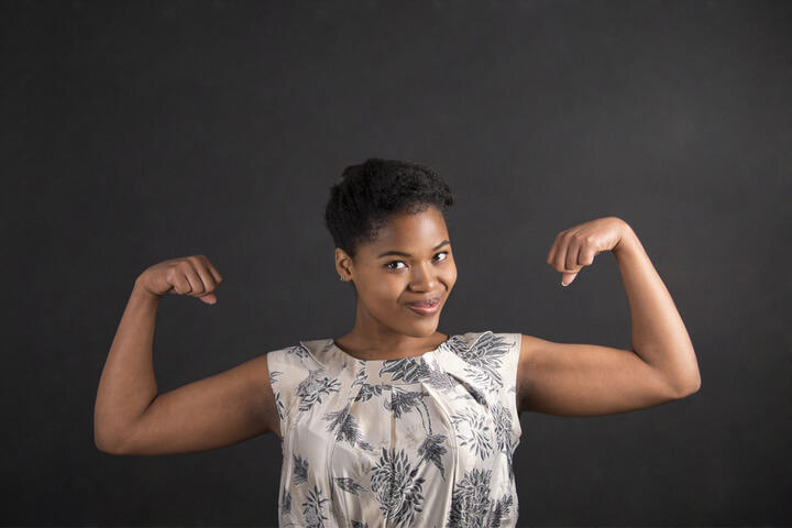 A Women flexing her muscles