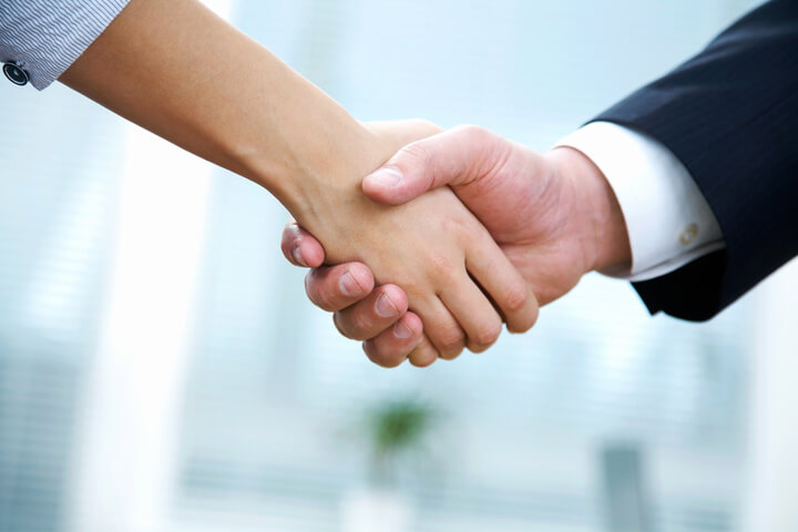 Handshake between two people