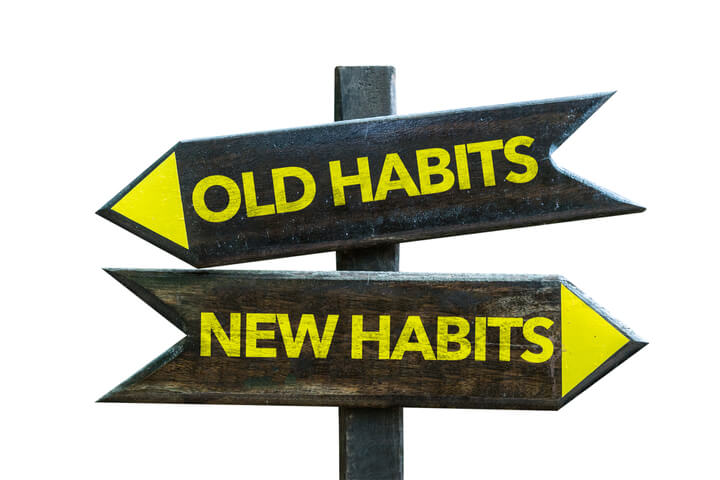 Sign that directs to 'Old Habits' & 'New Habits'