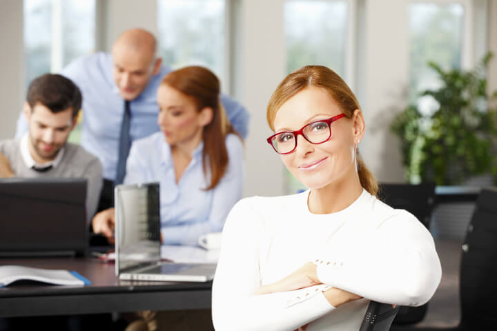 A group of co-workers working on a project together