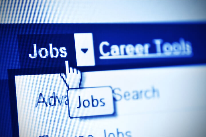 Mouse clicking on the word "Jobs" on a career tools website