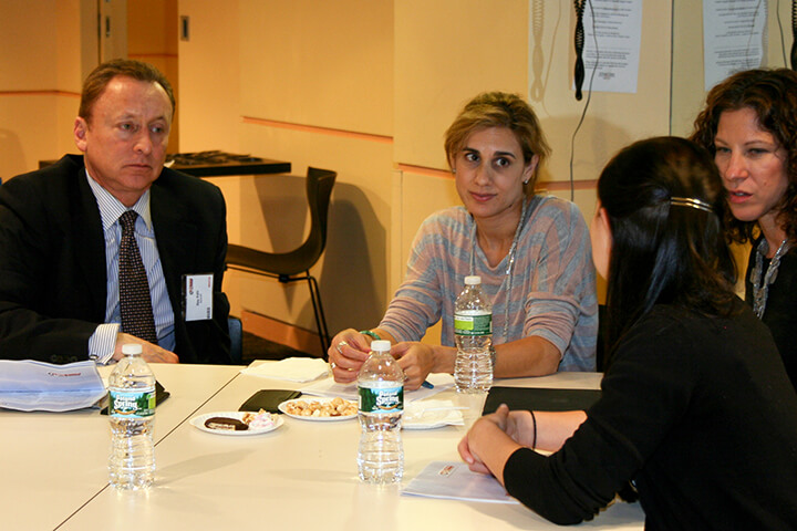 Group of people in a break-out discussion during a WISE Within Event