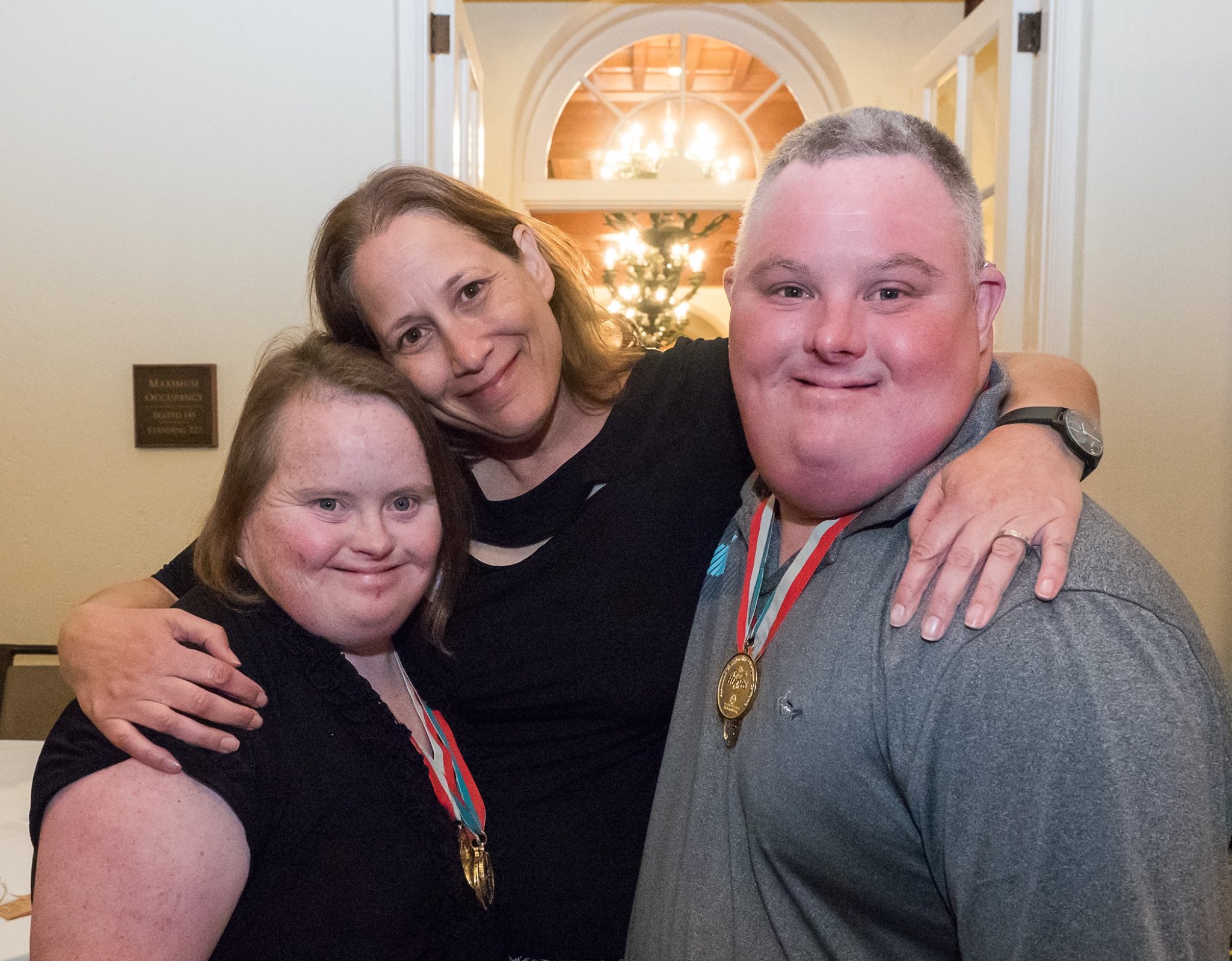 Ilisa Kessler pictured with two of he favourite special olympic athletes Lindsay and Ryan
